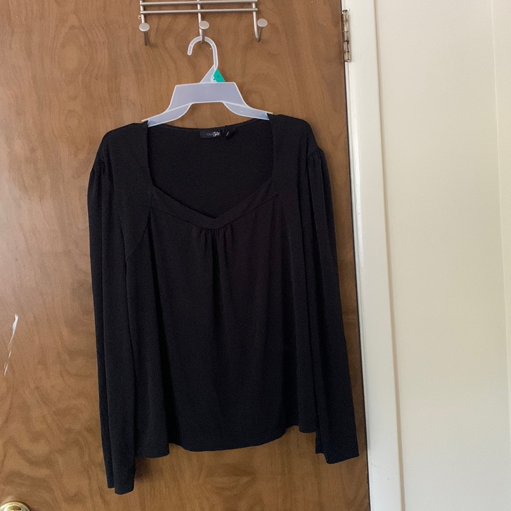 Black formal shirt. X- Large fits like a Large. 95% polyester 5% spandex